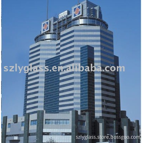 Heat-reflective coated glass